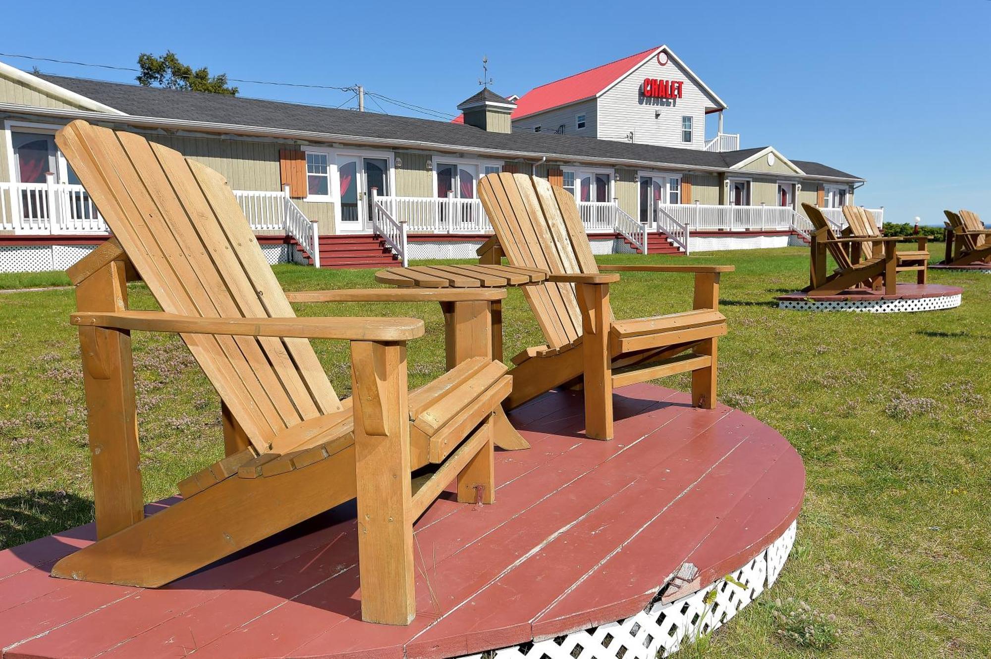 Motel Et Chalets Bo-Fleuve Evangeline Сен-Симеон Номер фото