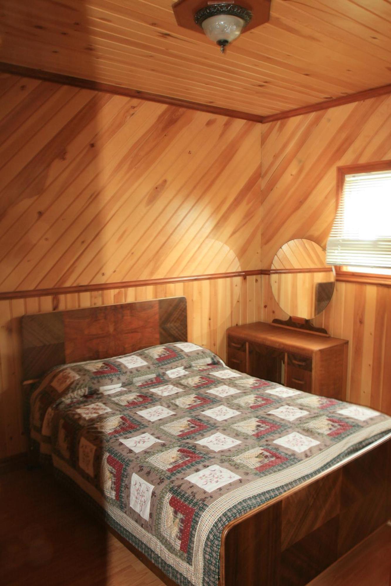 Motel Et Chalets Bo-Fleuve Evangeline Сен-Симеон Номер фото